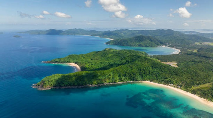 Tropical Sandy Beaches on coastline in El Nido. Nacpan Beach. Palawan, Philippines.