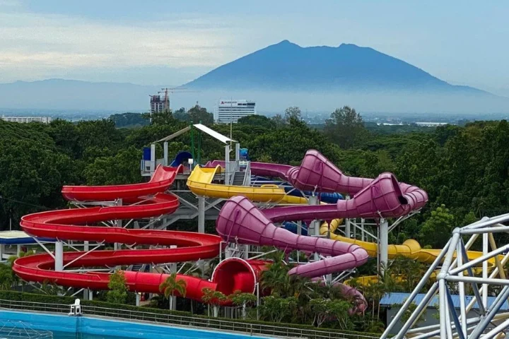 Water slides at Aqua Planet with Mount Arayat behind, Clark